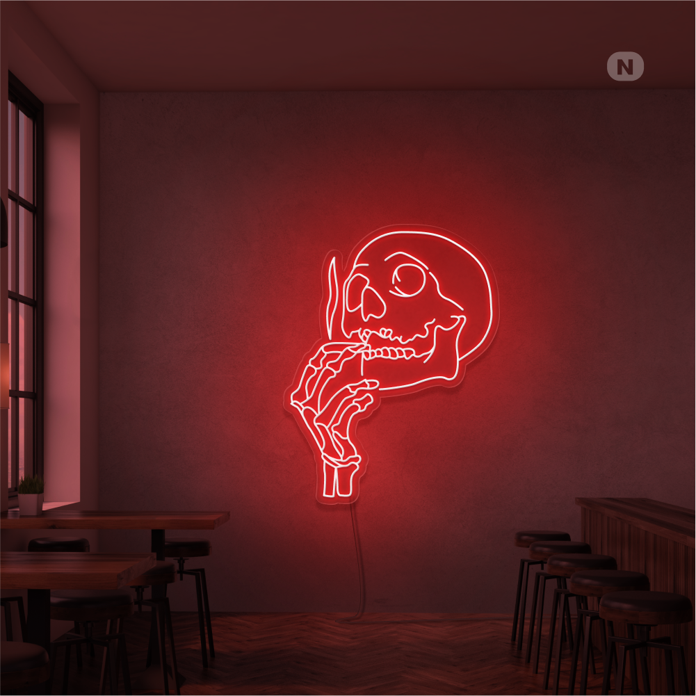 Neonskilt med røykende hodeskalle