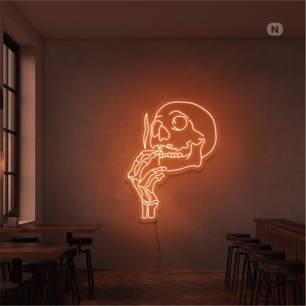Neonskilt med røykende hodeskalle
