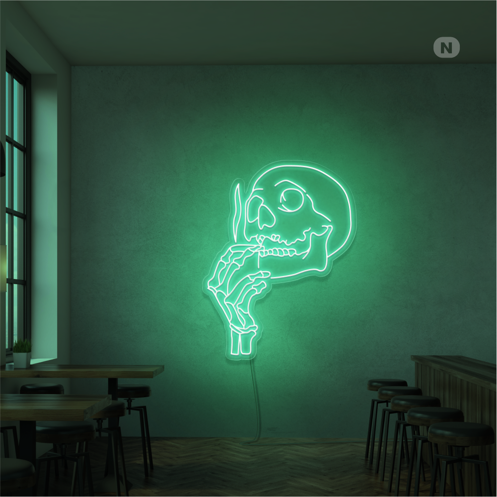 Neonskilt med røykende hodeskalle