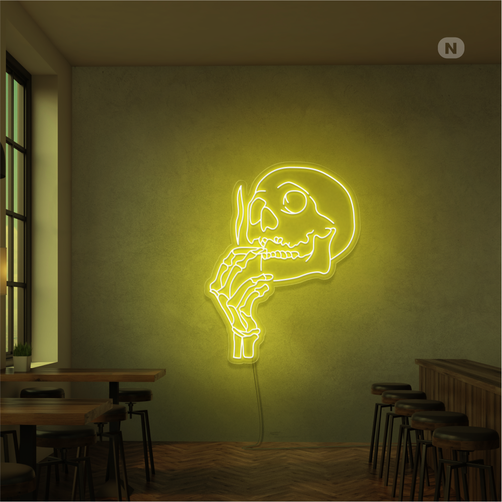 Neonskilt med røykende hodeskalle