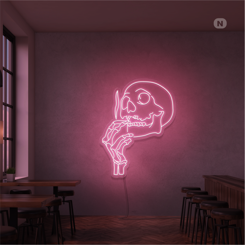 Neonskilt med røykende hodeskalle
