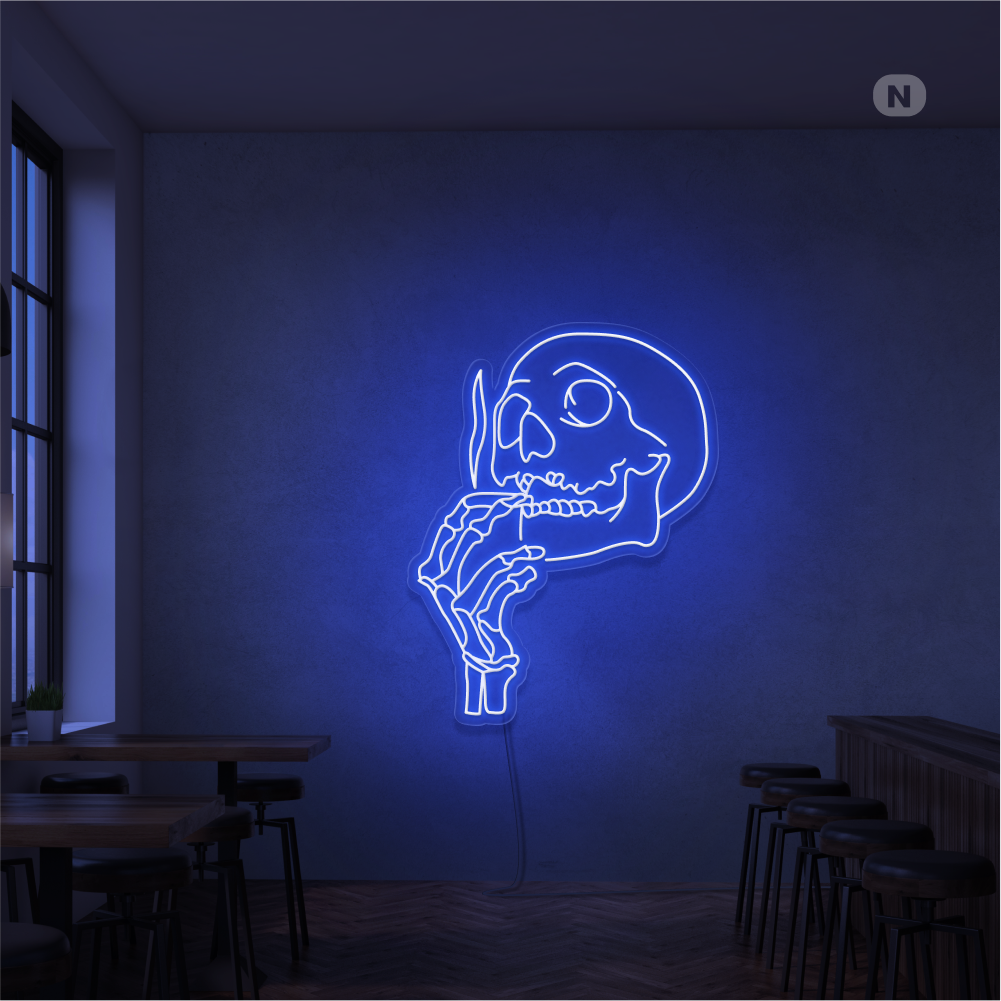 Neonskilt med røykende hodeskalle