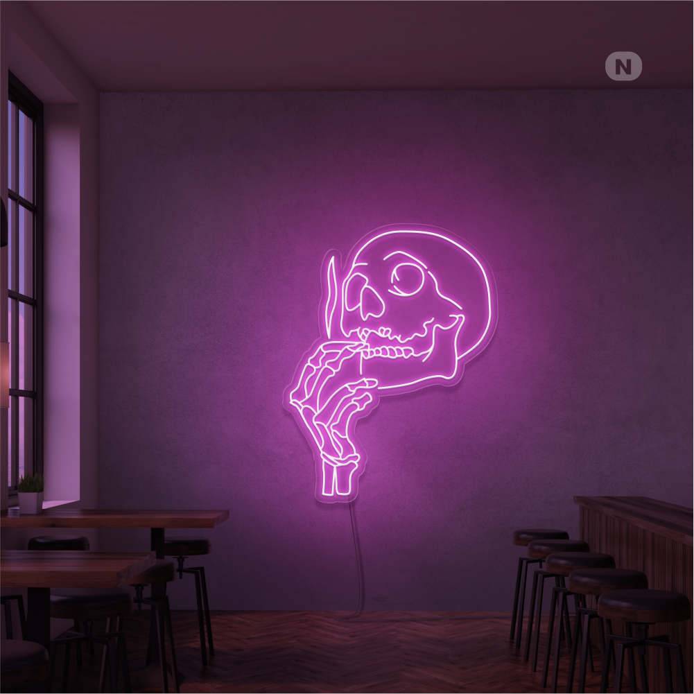 Neonskilt med røykende hodeskalle