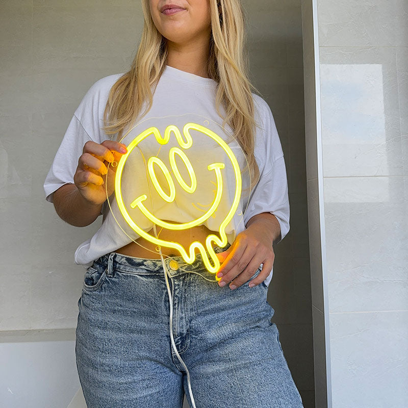 Neonskilt Smilende