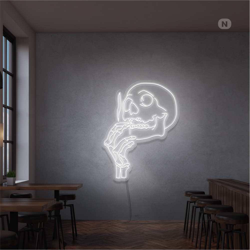 Neonskilt med røykende hodeskalle